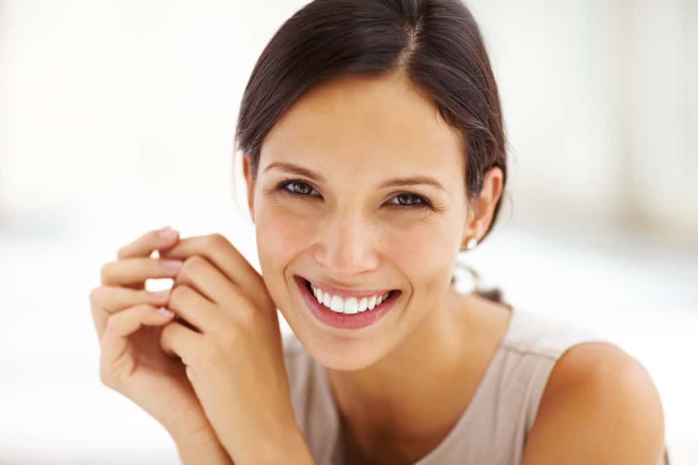 woman smiles - gum grafting toronto - downtown dentistry